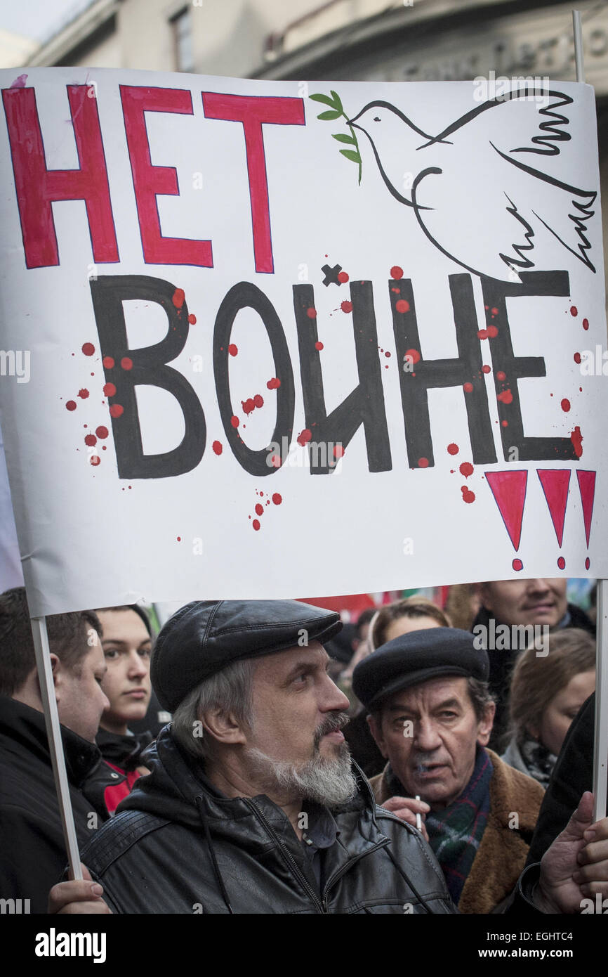 Moscow, Russia. 21st Feb, 2015. Man holds a banner with text &#39;&#39;No war&#39;&#39;. The march of February 21, 2015 dedicated to an anniversary of protests in the Ukraine that started on Kiev&#39;s