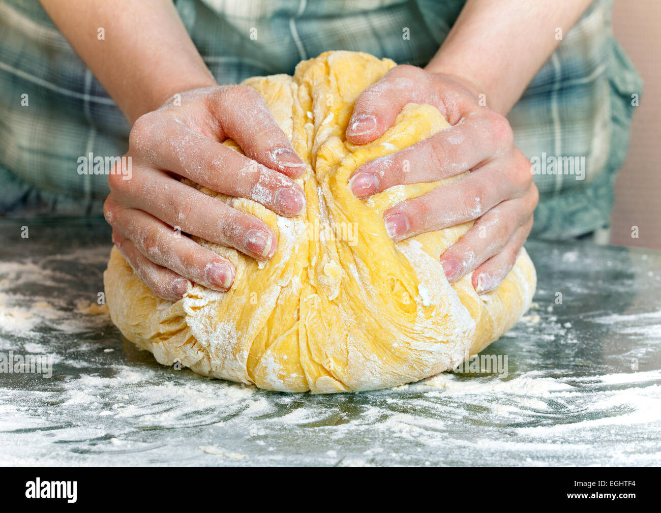Female hands kneading yeast dough Stock Photo - Alamy