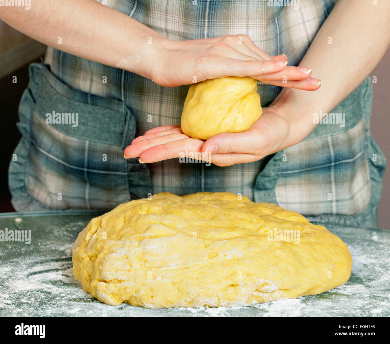 Female hands kneading yeast dough Stock Photo - Alamy