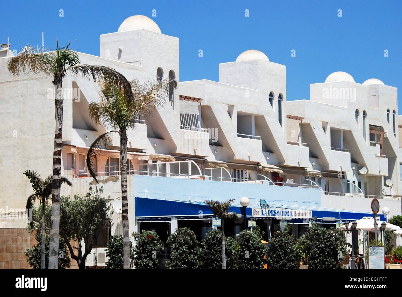 Seafood restaurant and apartment blocks, Garrucha, Almeria Province, Costa Almeria, Andalusia, Spain, Western Europe. Stock Photo
