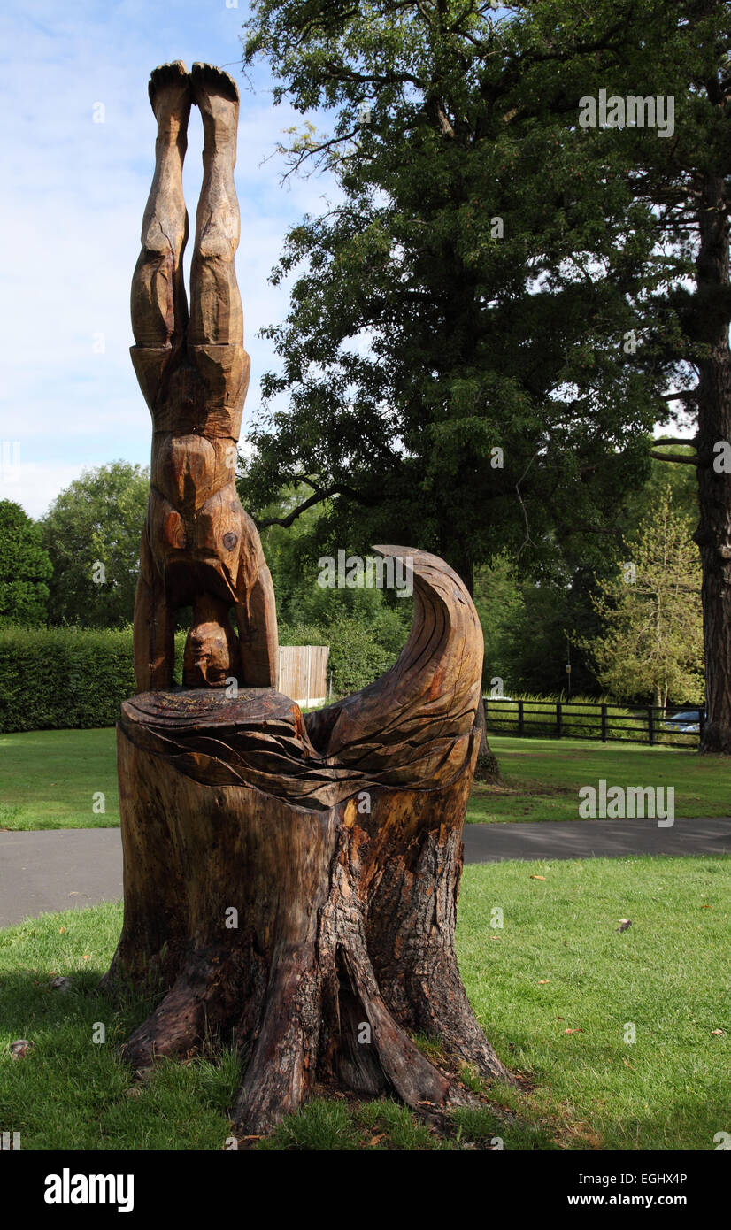 Wood carving from a  dead tree stump in Lido Park in Droitwich, Worcestershire Stock Photo