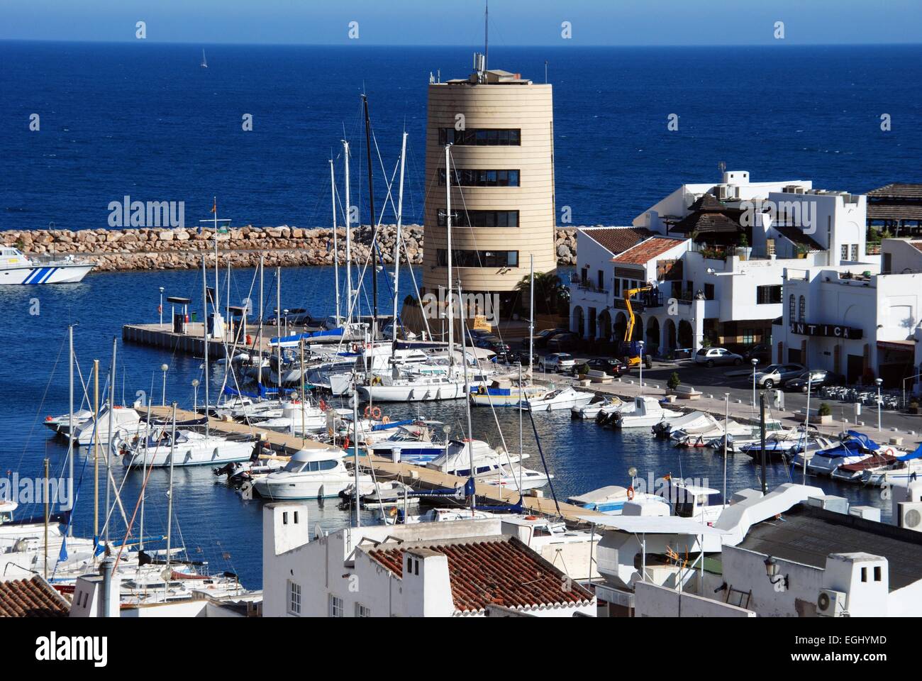 View of the harbour and watchtower, Roquetas de Mar, Almeria Province, Andalusia, Spain, Western Europe. Stock Photo