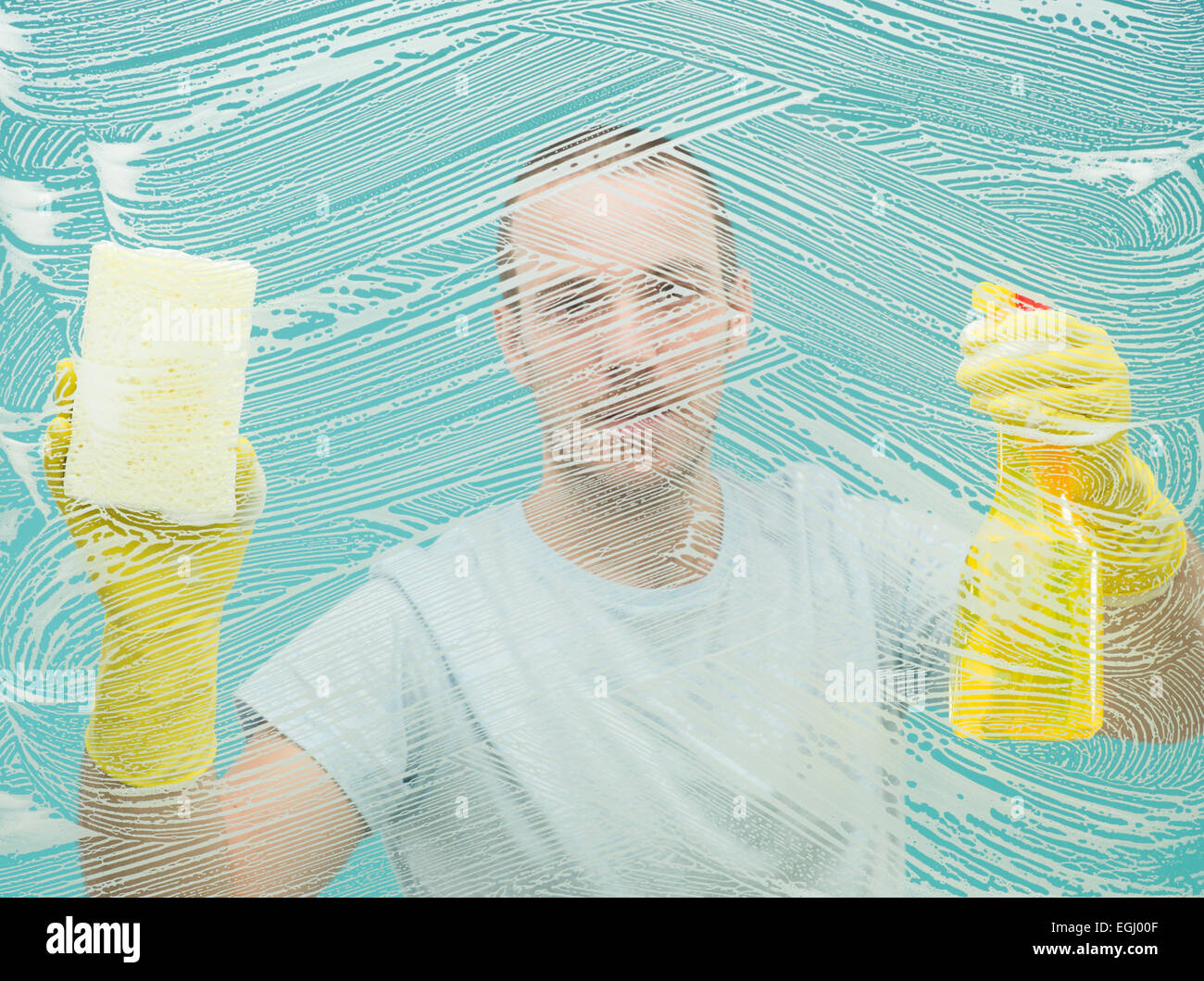 man washing window with liquid detergent and sponge with blue background Stock Photo