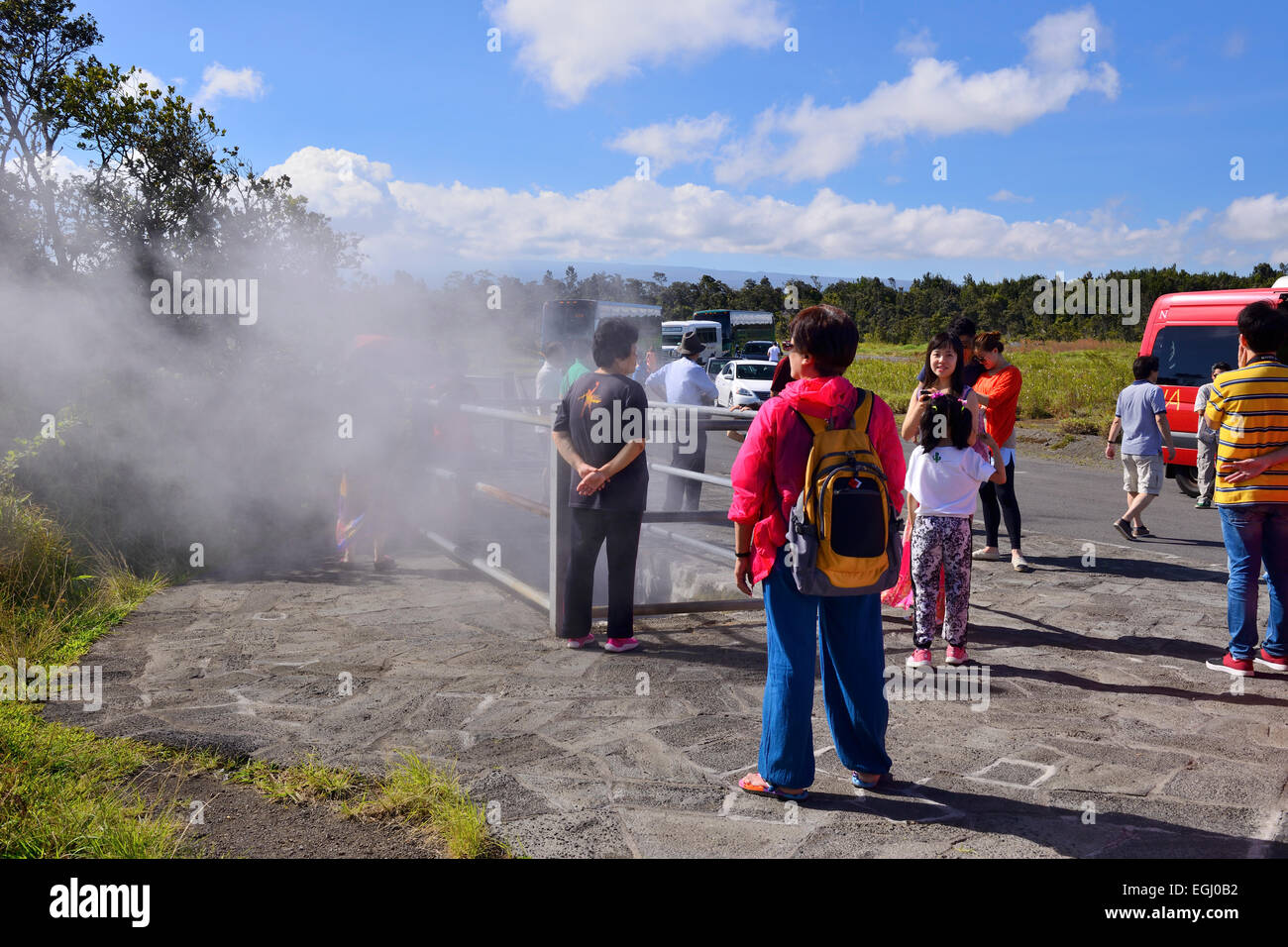 Tourists at steam vent in Volcanoes National Park on Big Island, Hawaii, USA Stock Photo