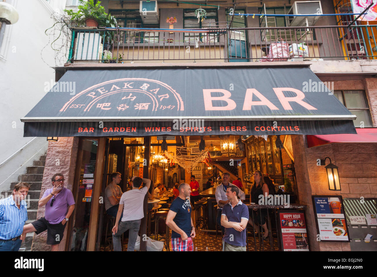 China, Hong Kong, Soho, Foreign Expats Drinking at Typical Bar Stock