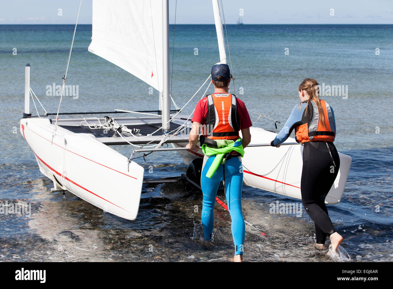 Sailing lessons, launching the catamaran Stock Photo Alamy