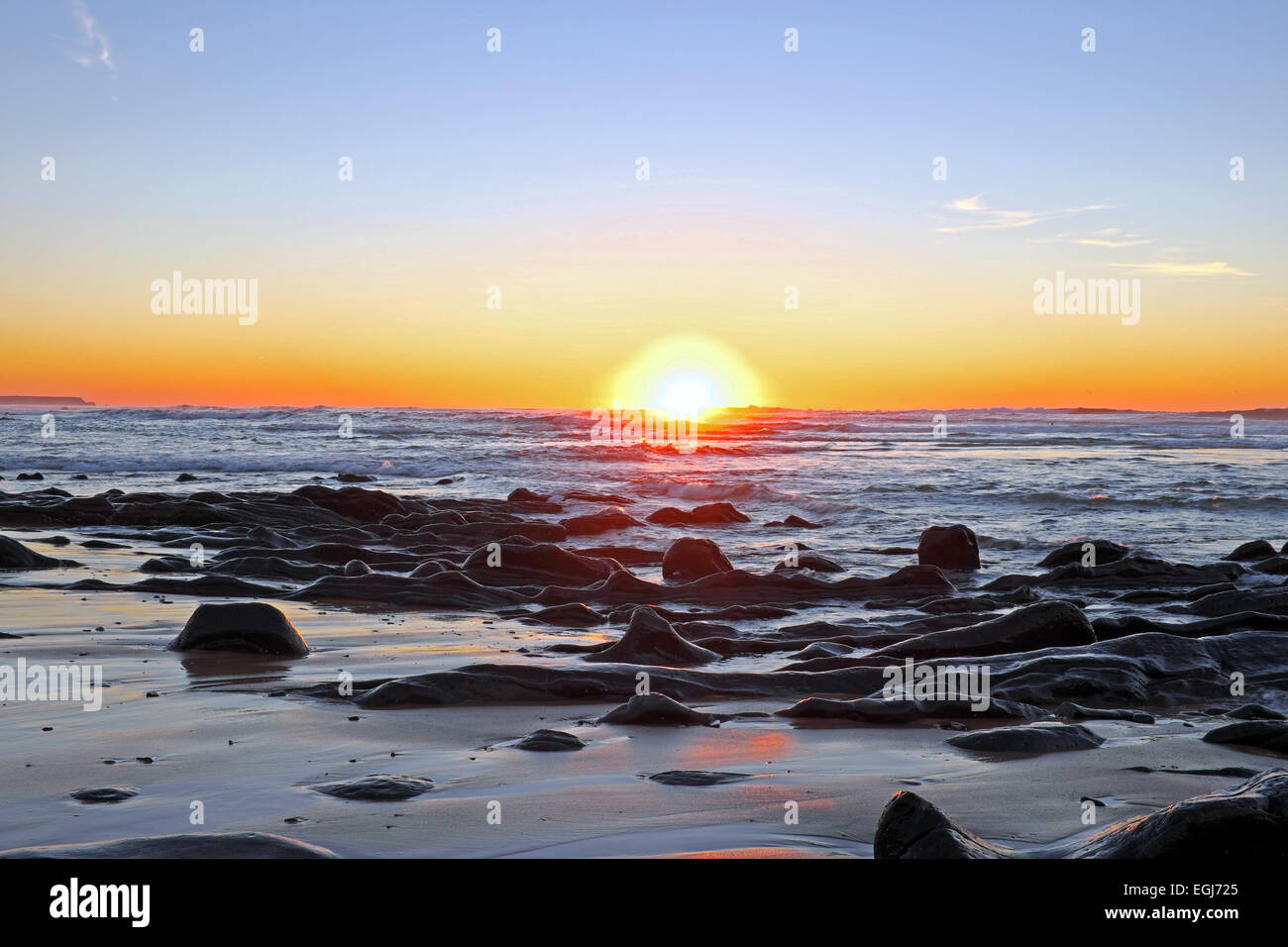 Sunset at Praia Vale Figueiras in Portugal Stock Photo