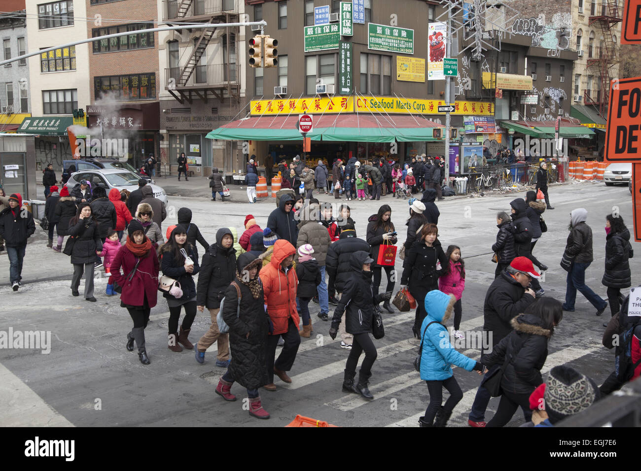 Chinatown at Chrystie & Grand Streets as people walk to a local park to celebrate Chinese New Year 2015, The Year  Of The Ram, w Stock Photo
