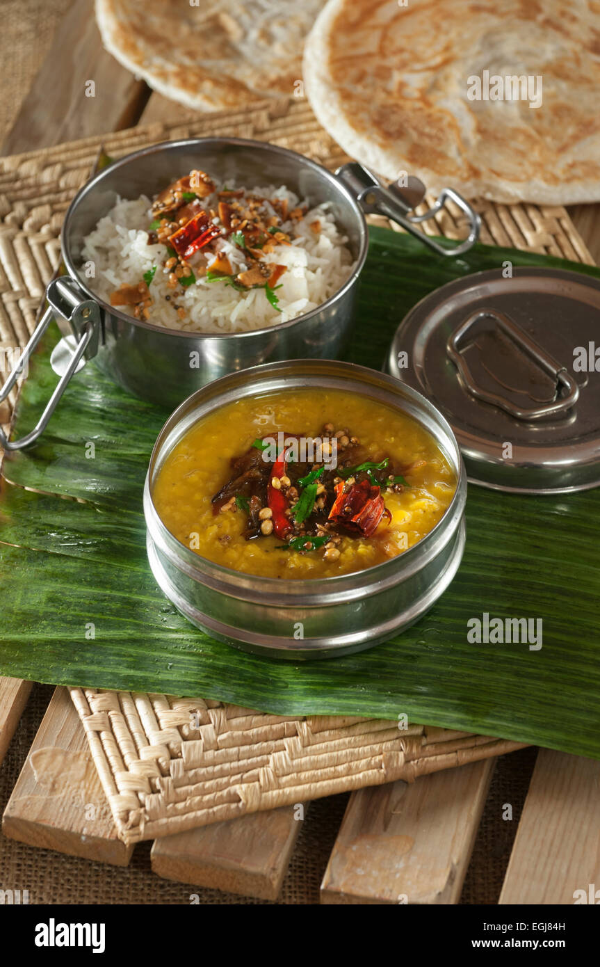 Dhal and rice in tiffin box. India Food Stock Photo