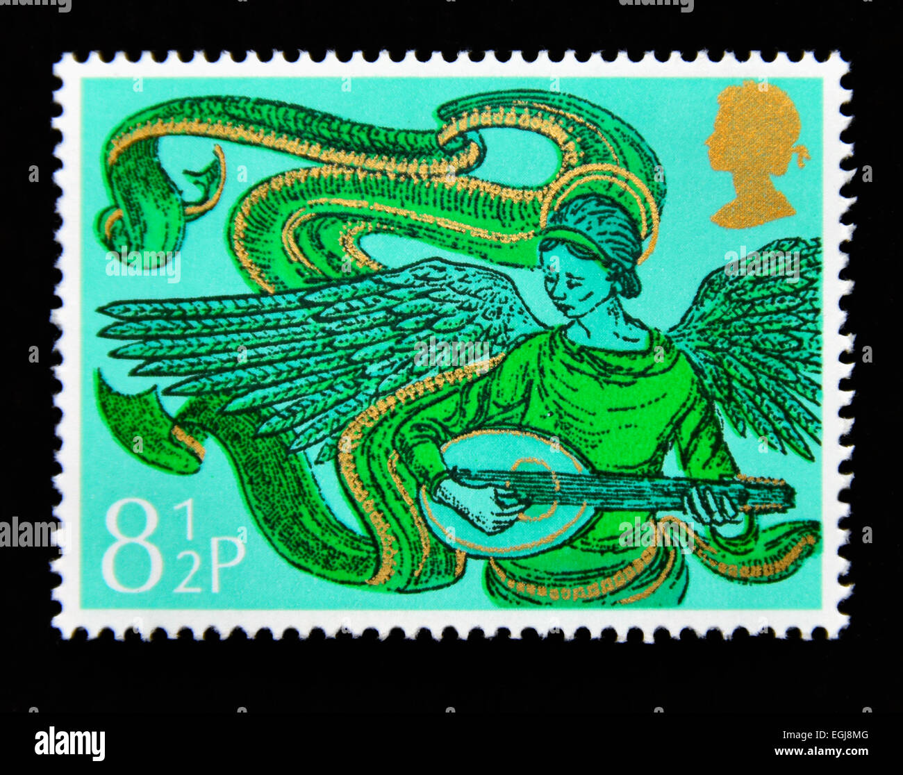 Postage stamp. Great Britain. Queen Elizabeth II. 1975. Christmas. Angel with Mandolin. Stock Photo