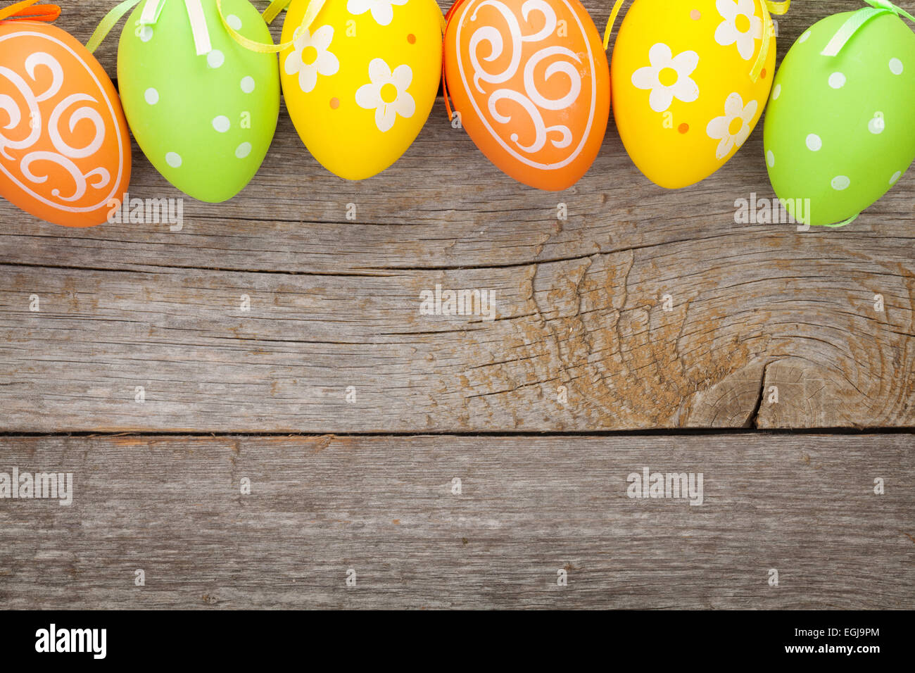 Easter eggs on wooden table background with copy space Stock Photo - Alamy