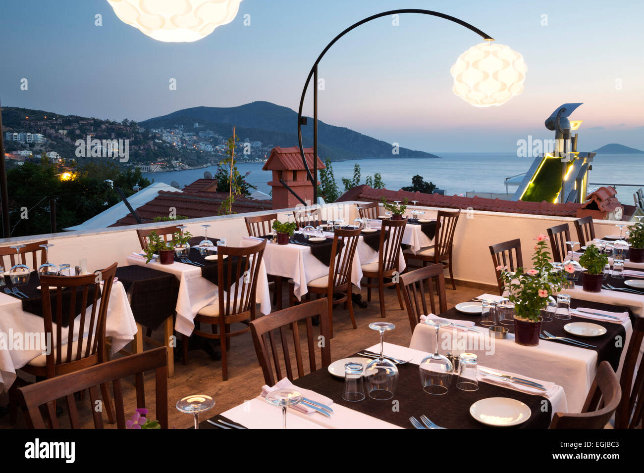 Rooftop restaurant in evening, Kalkan, Lycia, Antalya Province, Mediterranean Coast, Southwest Turkey, Turkey, Asia Stock Photo