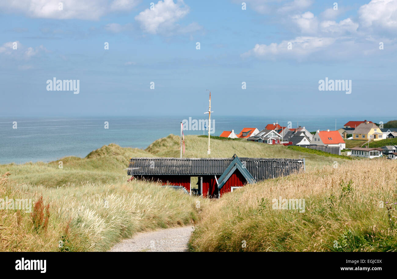 Walking path in the dunes among summer cottages in Lønstrup, Loenstrup, a tourist resort at the North Sea in the north-western Jutland, Denmark. Stock Photo