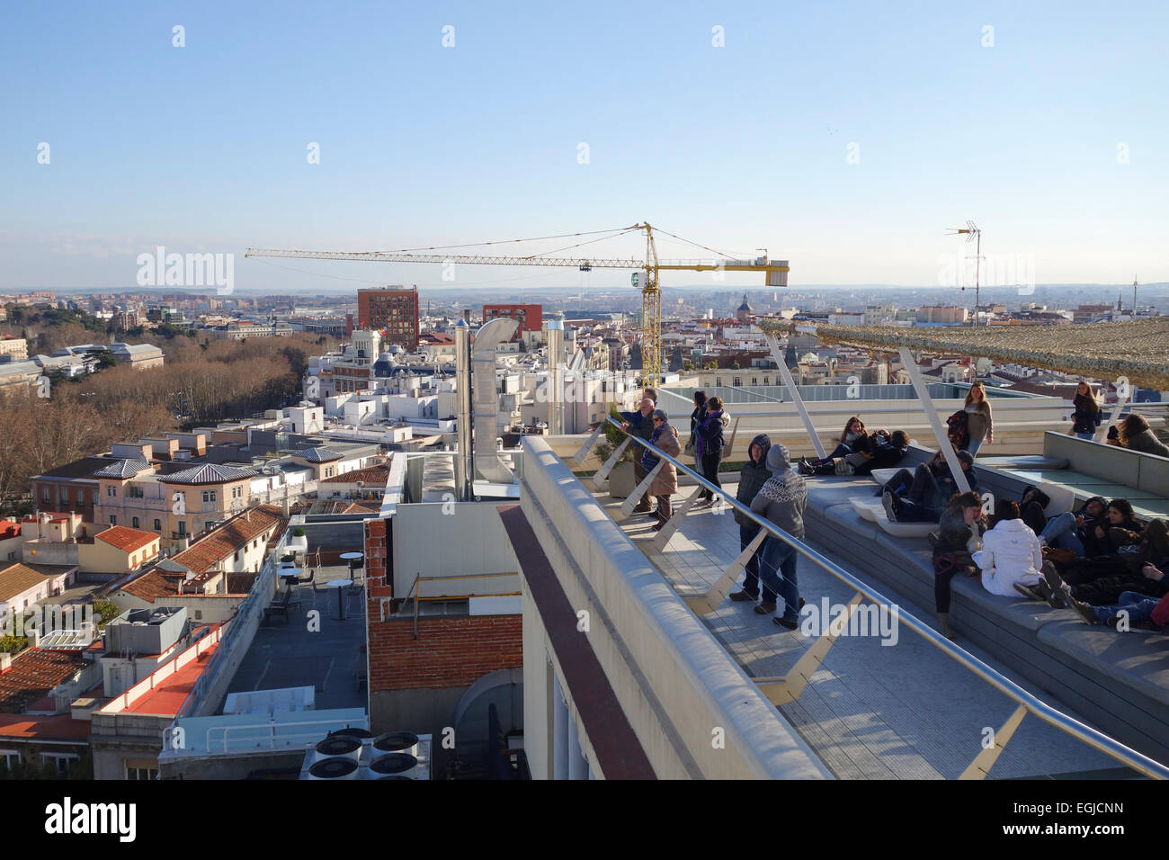 Visitors relaxing on rooftop terrace. loungers of Circulo de Bellas Artes Building, Madrid Spain. Stock Photo