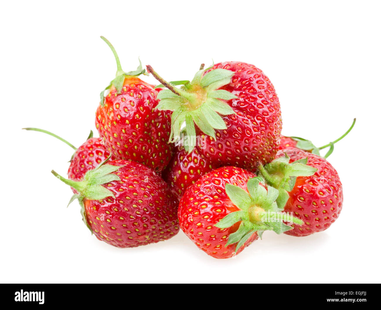 juicy ripe strawberries with leaves on a white background Stock Photo ...