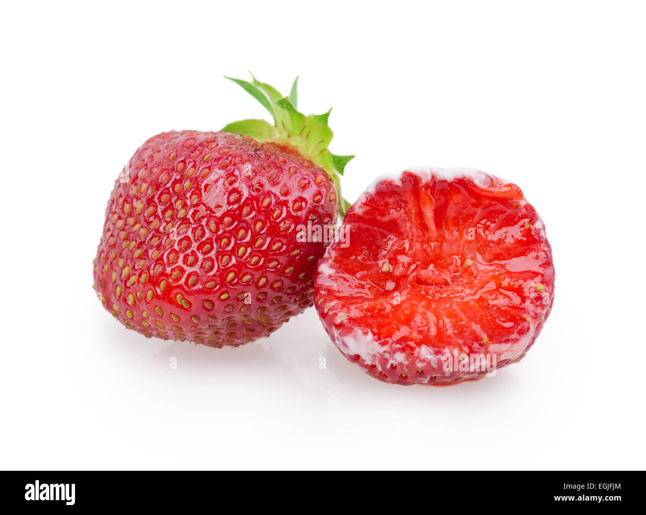 juicy ripe strawberries with leaves on a white background Stock Photo ...