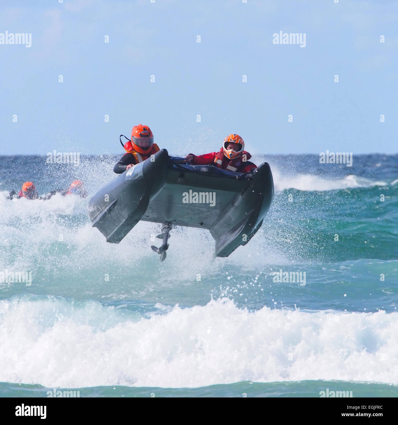 Two man crewed Zap cat racing boat airborne in the surf Stock Photo