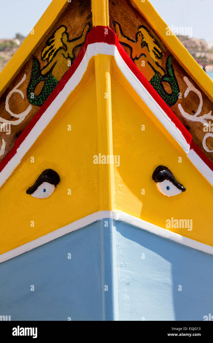The bow of a Luzzu, a traditional fishing boat of Marsaxlokk Malta Stock Photo