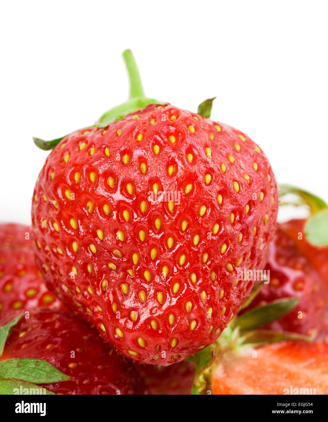 juicy ripe strawberries with leaves on a white background Stock Photo ...