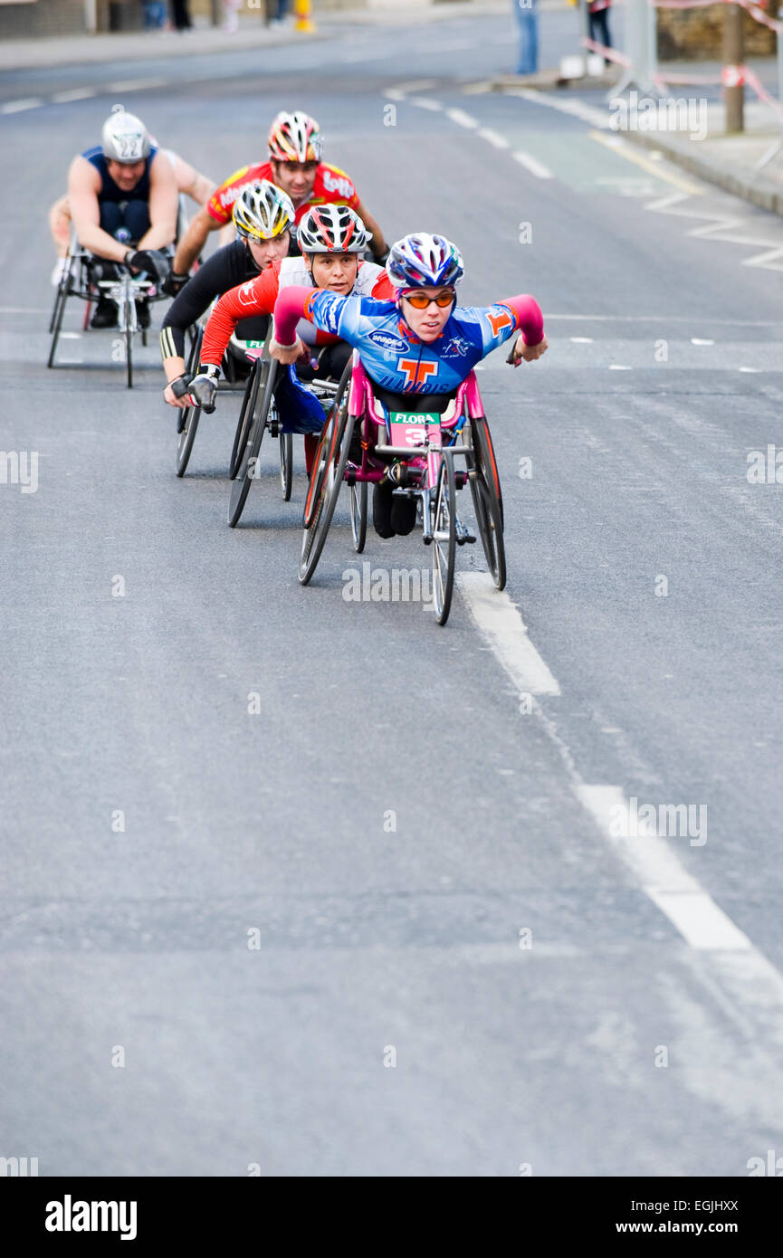 disabled athletes taking part in the london marathon wheelchair race Stock Photo