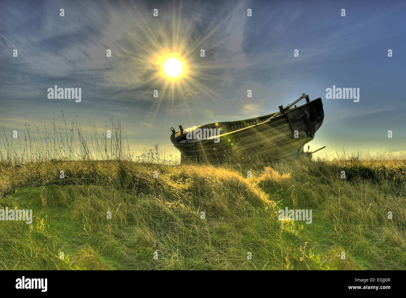 hdr image of an abandoned boat dungeness beach kent Stock Photo