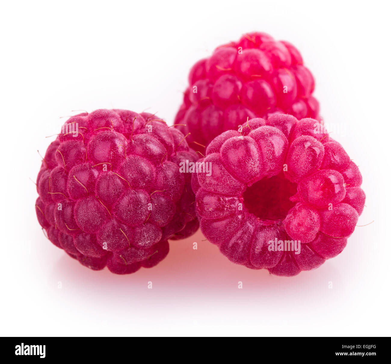 raspberries isolated on white background Stock Photo - Alamy
