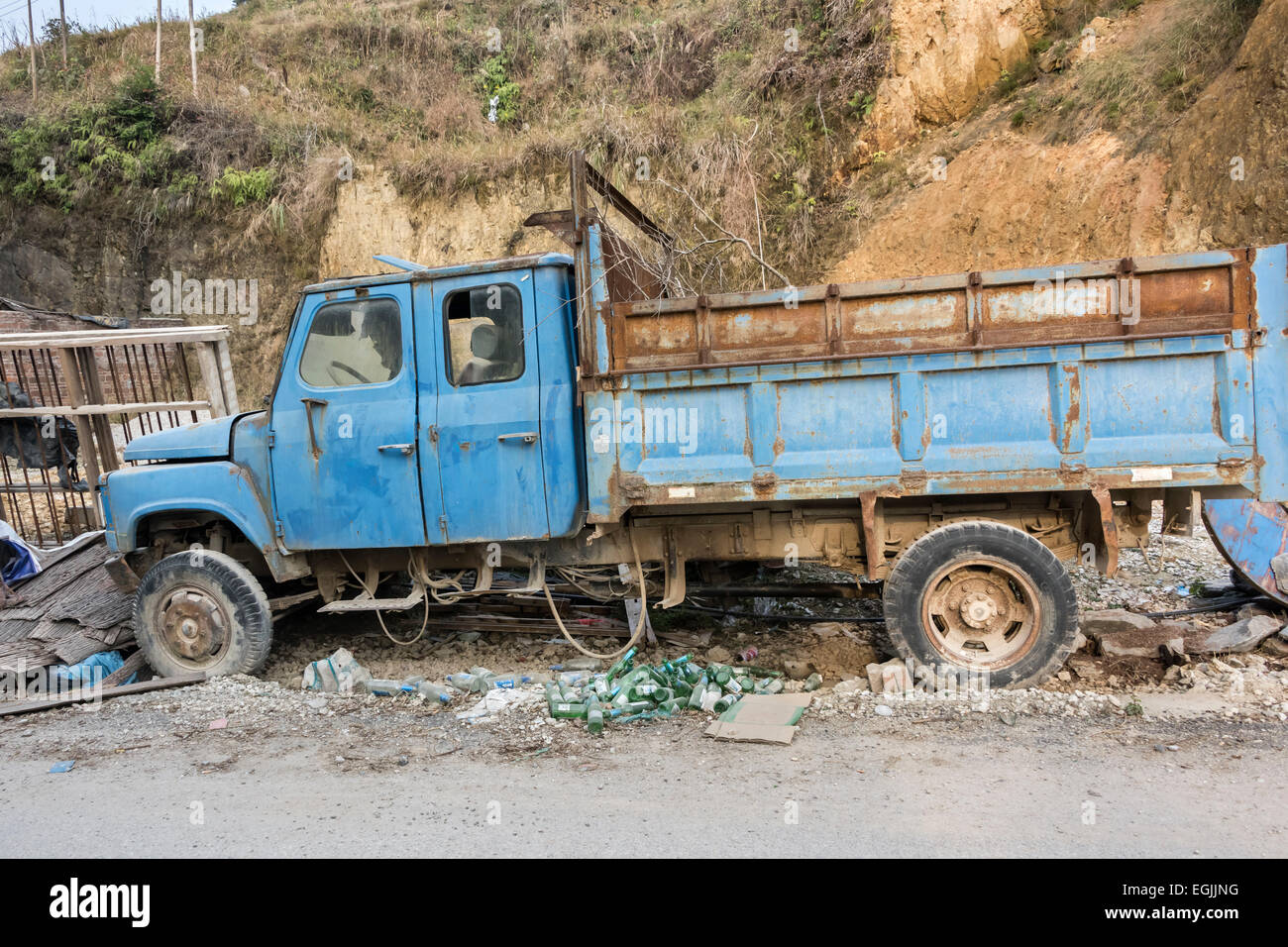 Old Chinese truck with beer bottles, Zhaoxing Dong village, Guizhou Province, China Stock Photo