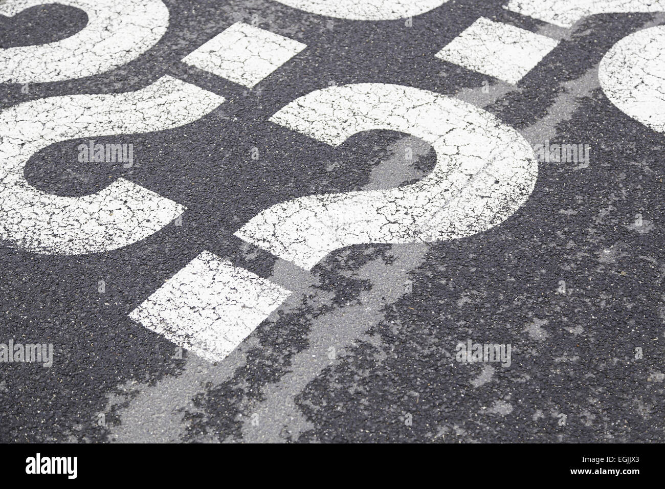 Sign question on asphalt, detailed interrogation signal, information