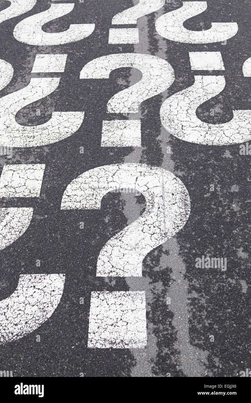 Sign question on asphalt, detailed interrogation signal, information