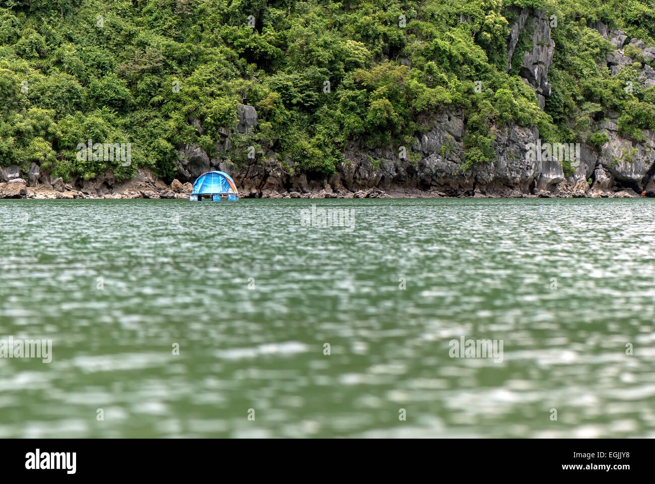 Fisherman camping at a wilderness Halong. Stock Photo