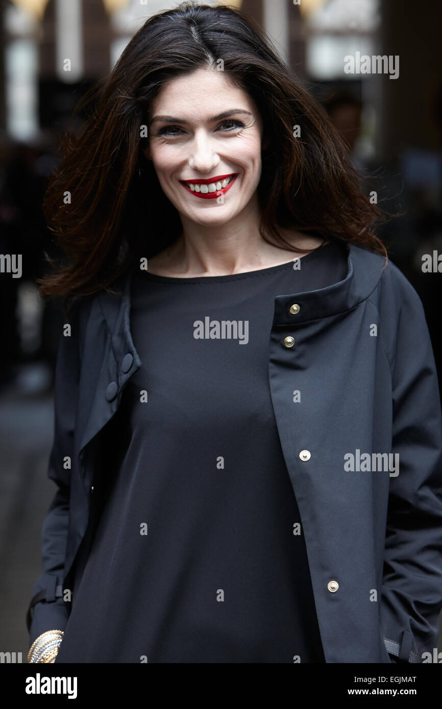 MILAN, ITALY - FEBRUARY 25: Milan Fashion Week Day 1, Fall/Winter 2015/2016 people street style and celebrities Stock Photo