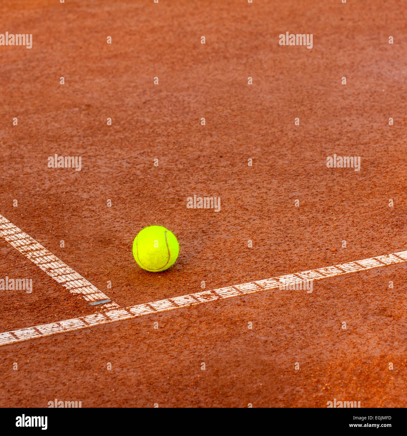 Tennis ball on a tennis clay court Stock Photo Alamy