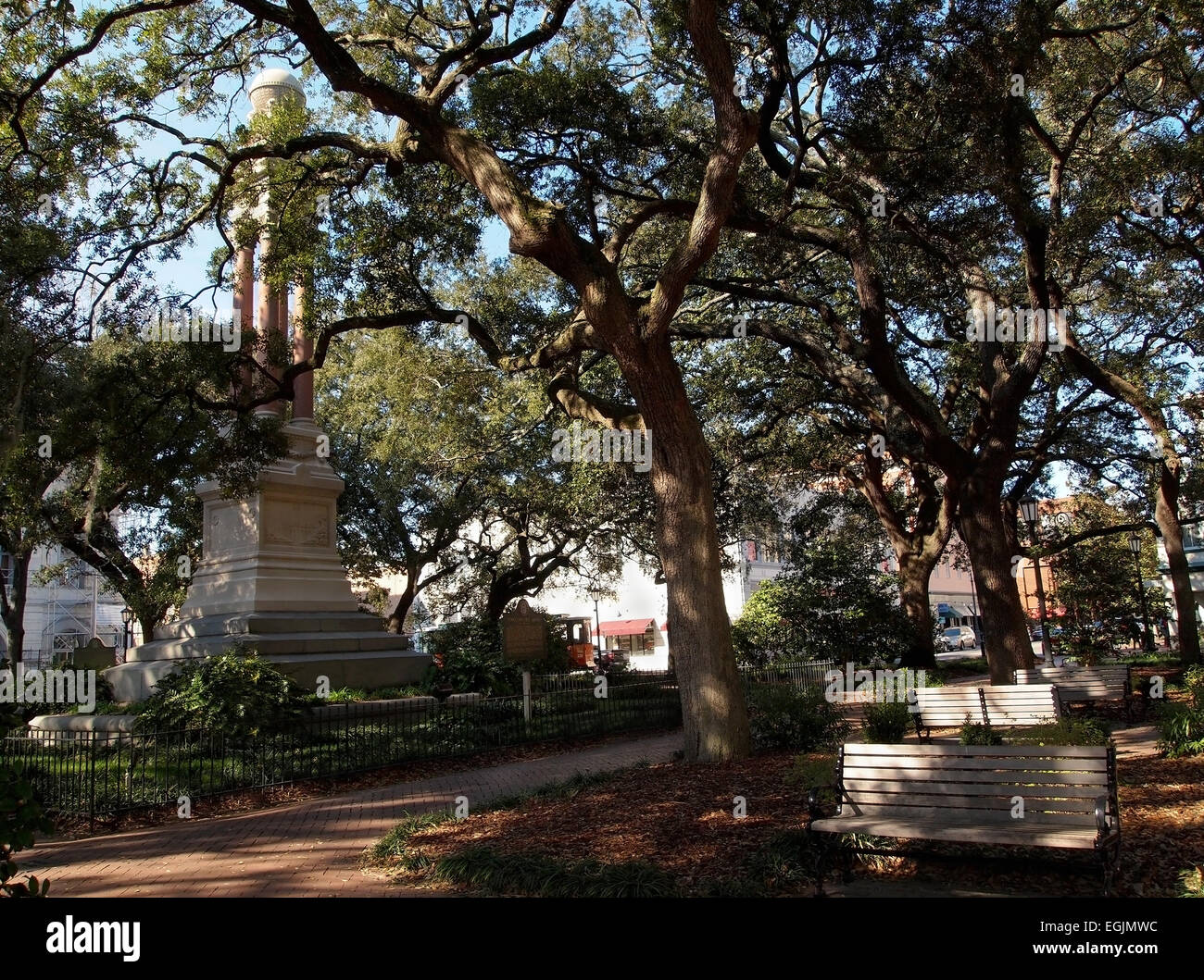 Wright Square, in Savannah, Georgia, is a lovely scenic park in the historic district with benches, large, old Live Oak trees pr Stock Photo