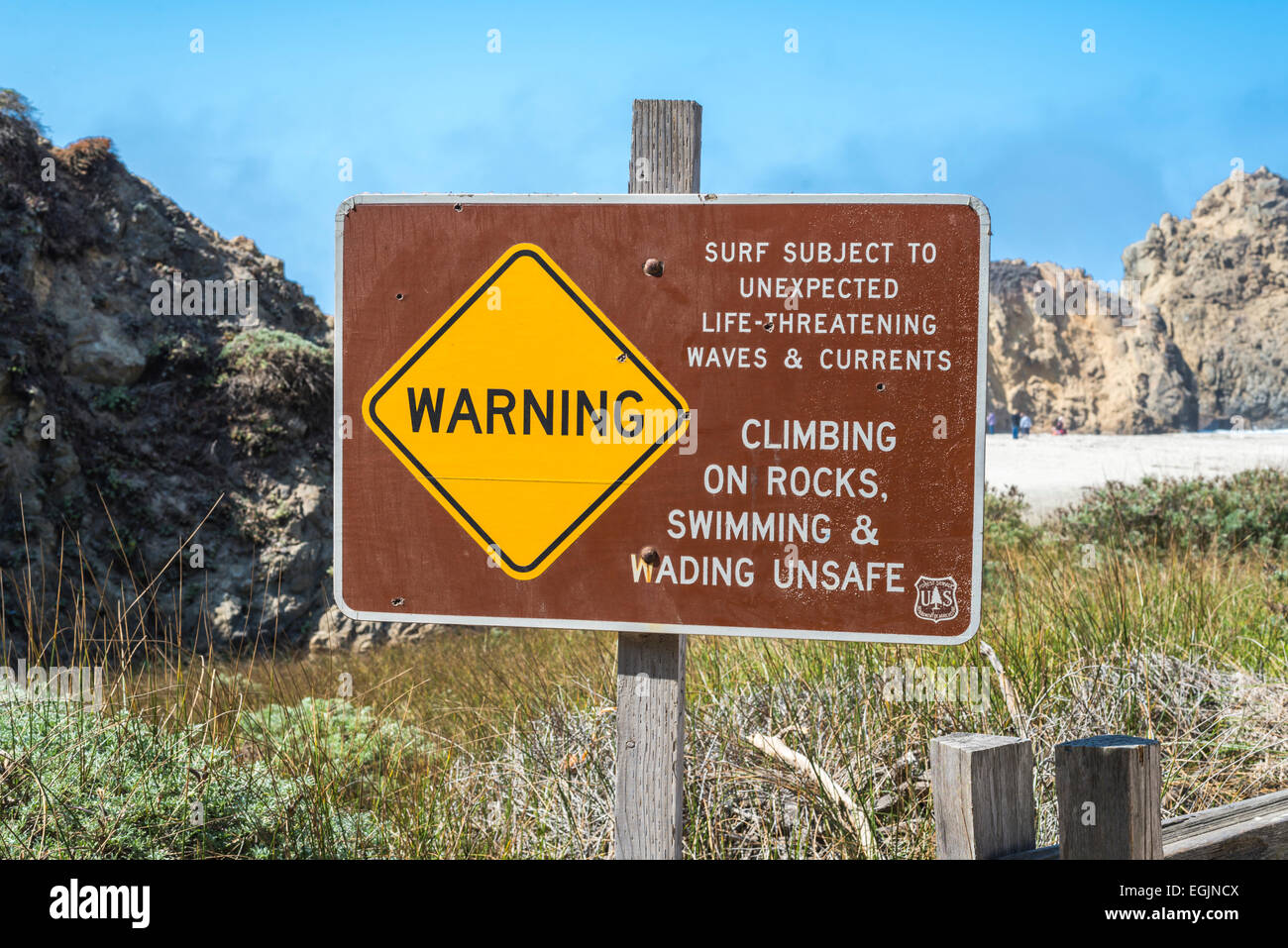 Warning sign seen as entering Pfeiffer Beach. Pfeiffer Big Sur State Park, California, United States. Stock Photo