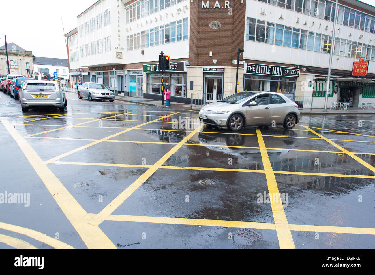 Cars in a yellow box junction in Cardiff, UK. Cameras have been
