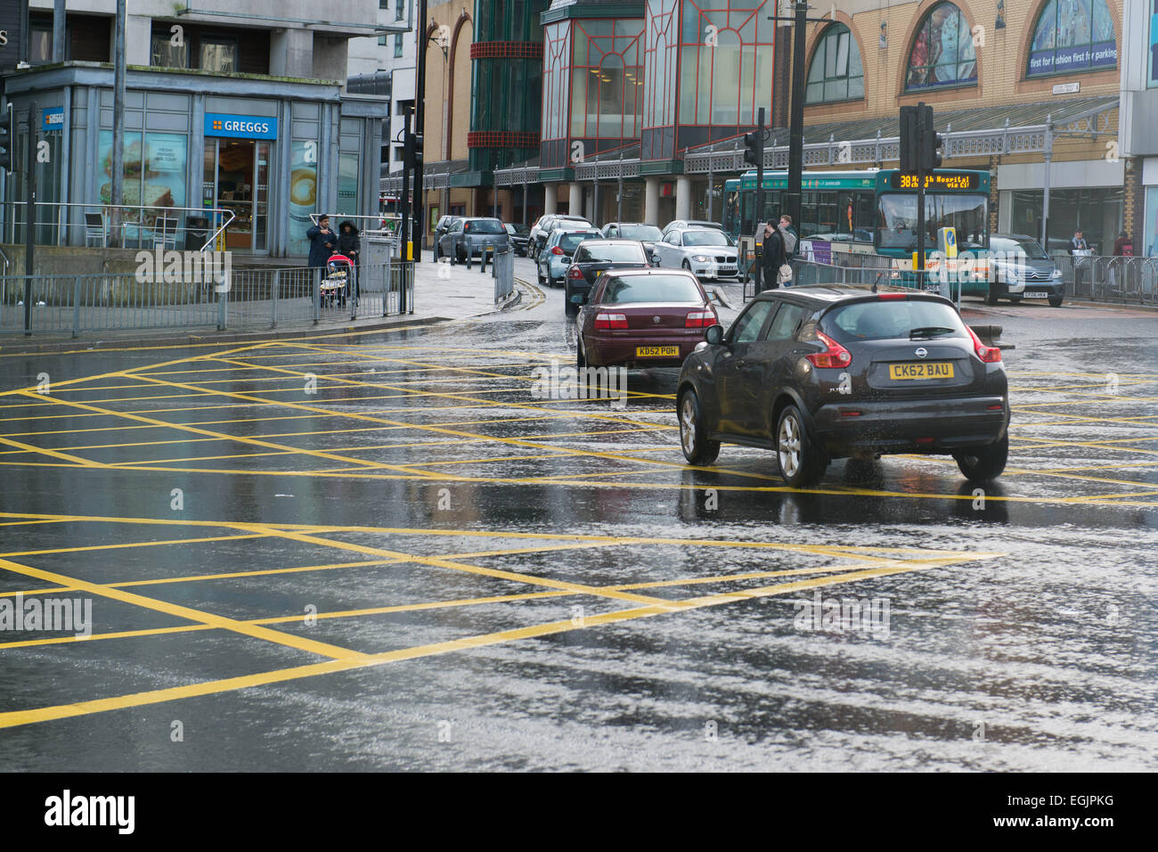 Cars in a yellow box junction in Cardiff, UK. Cameras have been