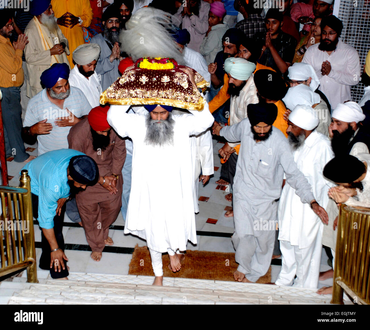 Carrying the sacred Guru Granth Sahib to bed in the Golden Temple ...