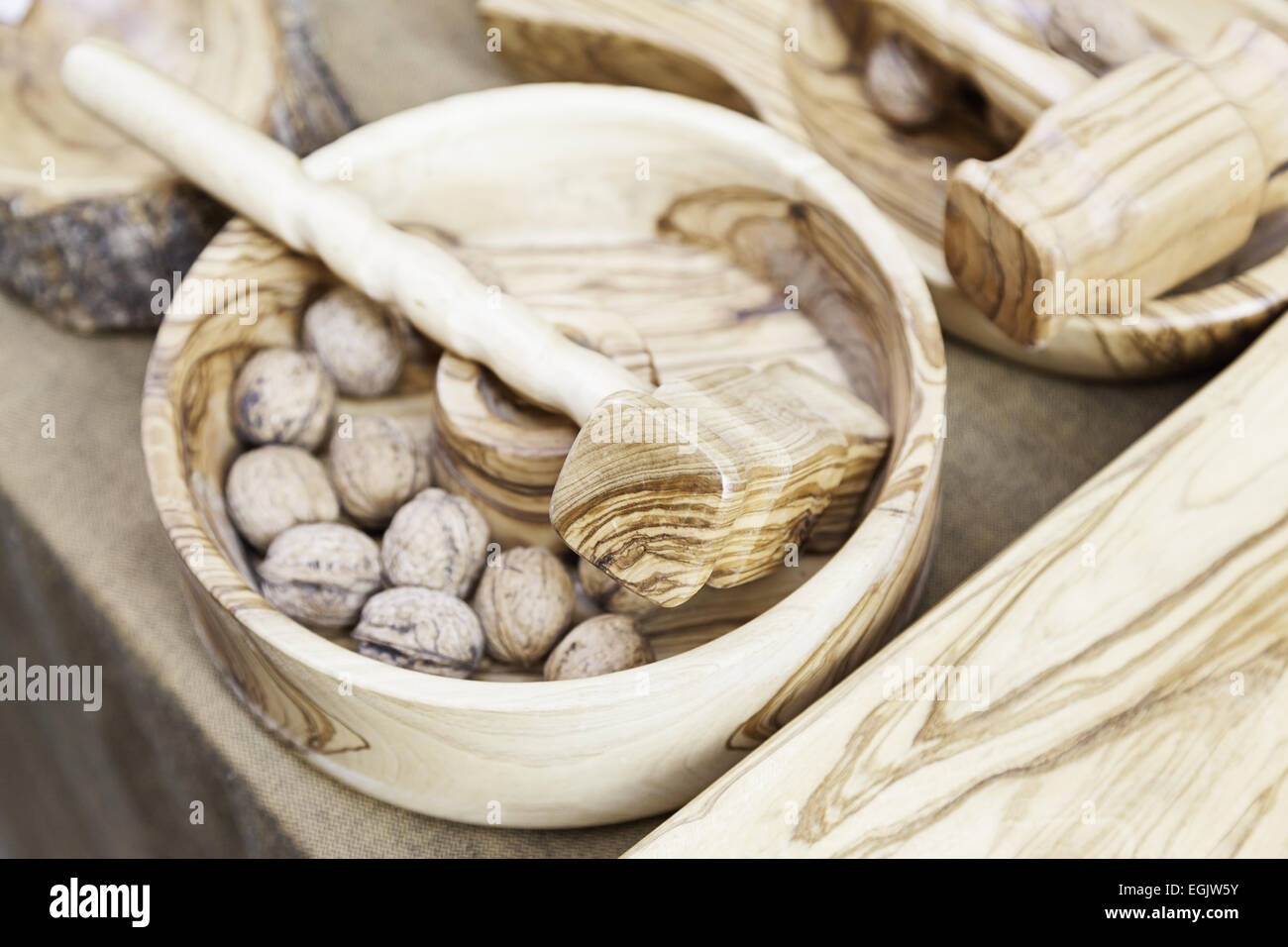 Wooden hammer for cracking nuts, detail of a tool to open nuts Stock