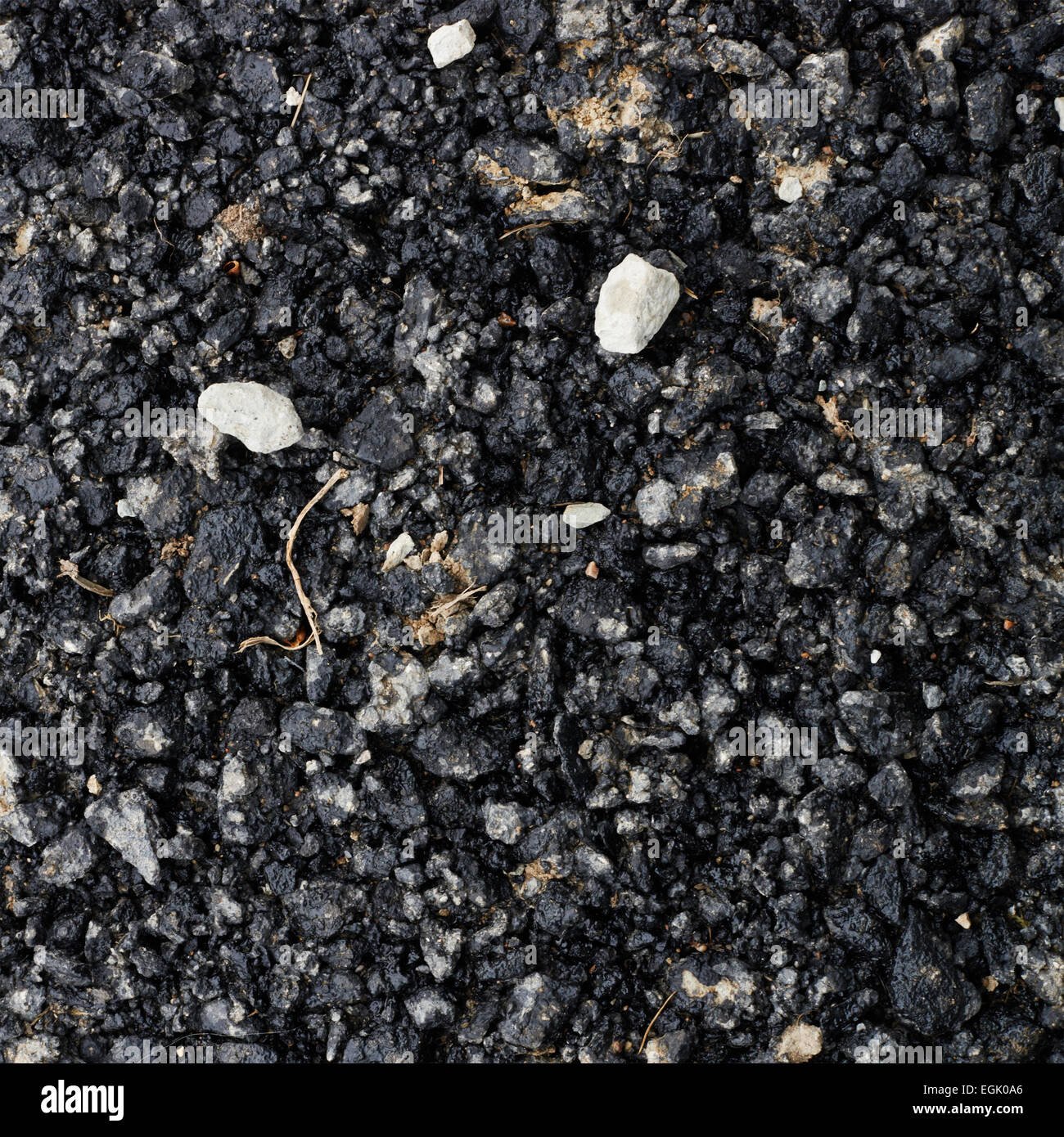 Pieces of broken bitumen asphalt Stock Photo