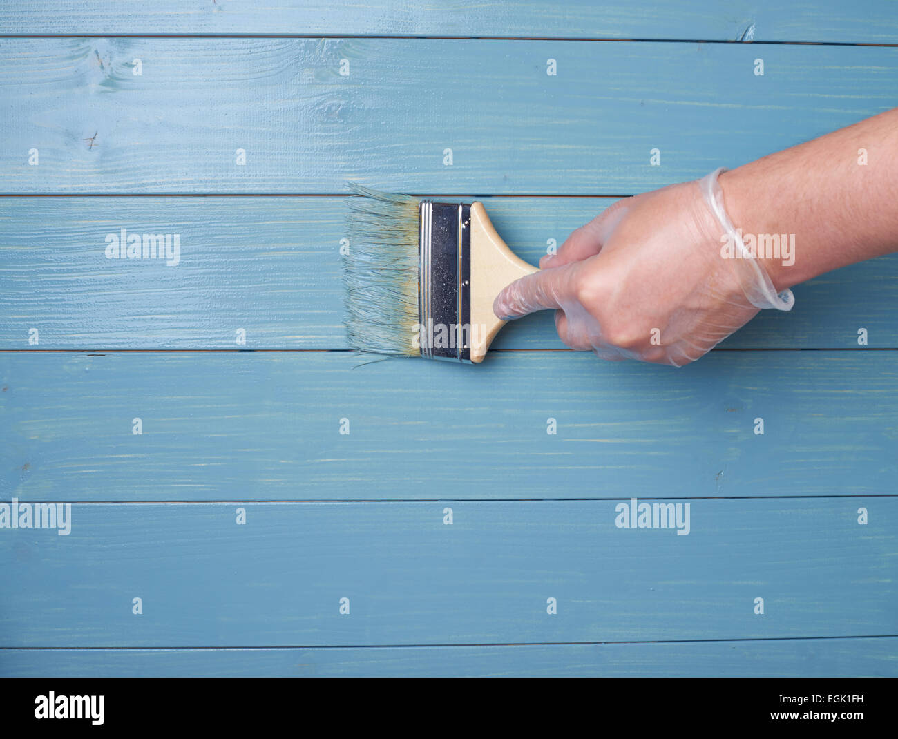 Process of painting wooden boards Stock Photo Alamy