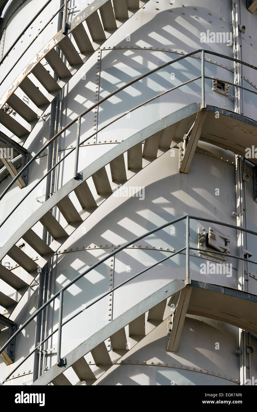 spiral staircase in a tower industrial processing Stock Photo