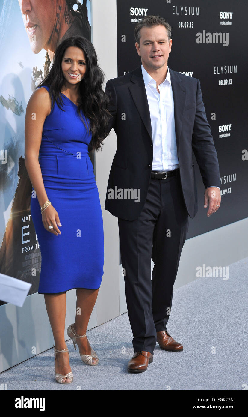LOS ANGELES, CA - AUGUST 7, 2013: Matt Damon & wife Luciana Barroso at the world premiere of his movie 'Elysium' at the Regency Village Theatre, Westwood. Stock Photo