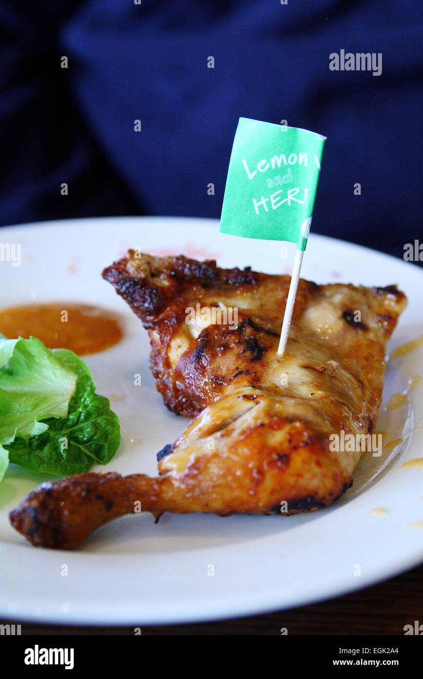 Nandos Chicken  Maryland with lettuce on a plate Stock Photo