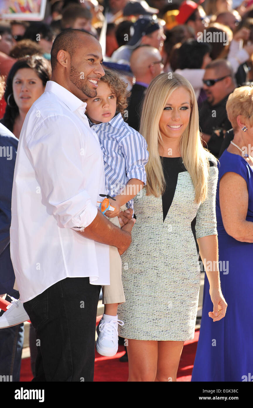LOS ANGELES, CA - AUGUST 5, 2013: Kendra Wilkinson Baskett & husband Hank Baskett III & son Hank Baskett IV at the world premiere of Disney's Planes at the El Capitan Theatre, Hollywood. Stock Photo