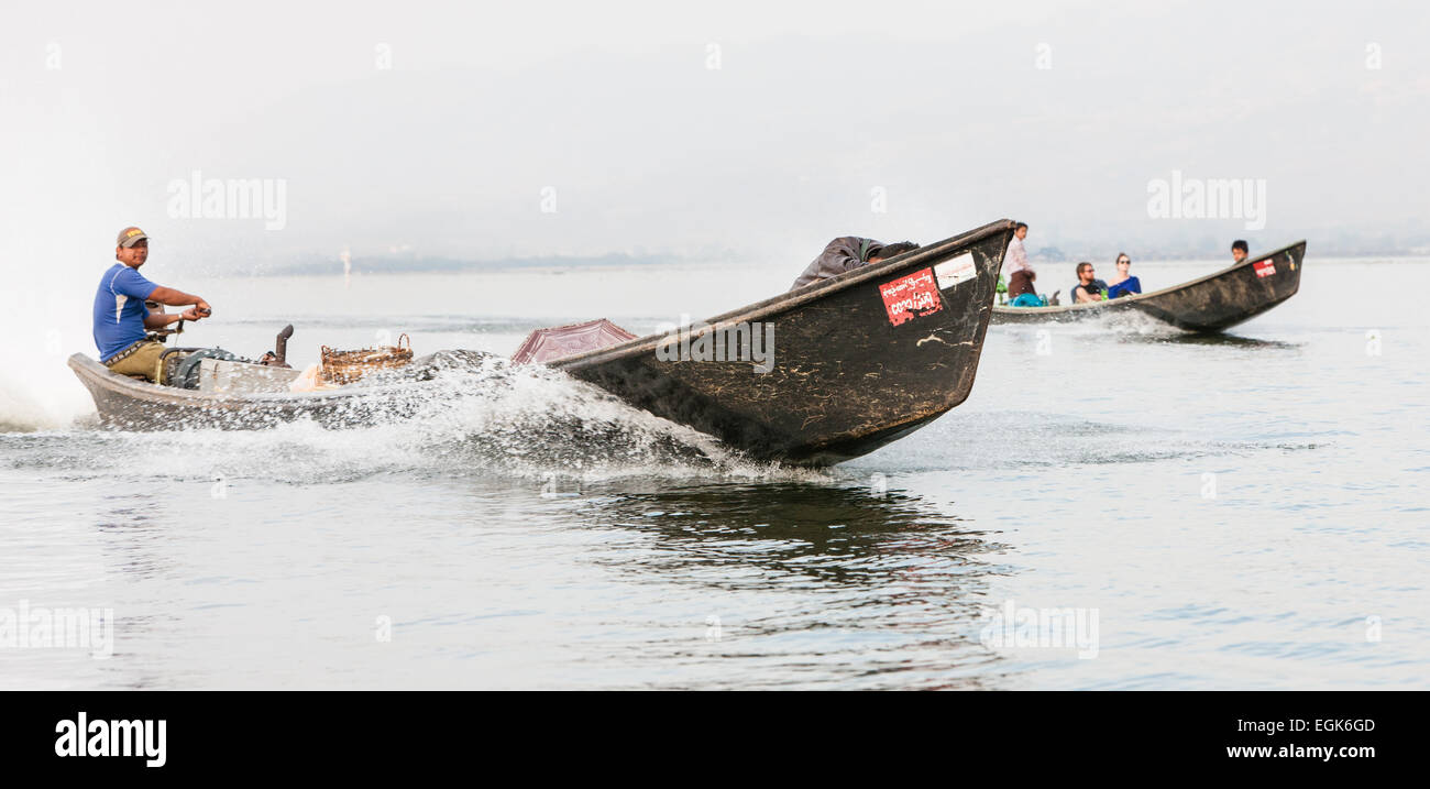 Speed boat ,longboat,long tailed engined boat on waterway canal of Inle ...