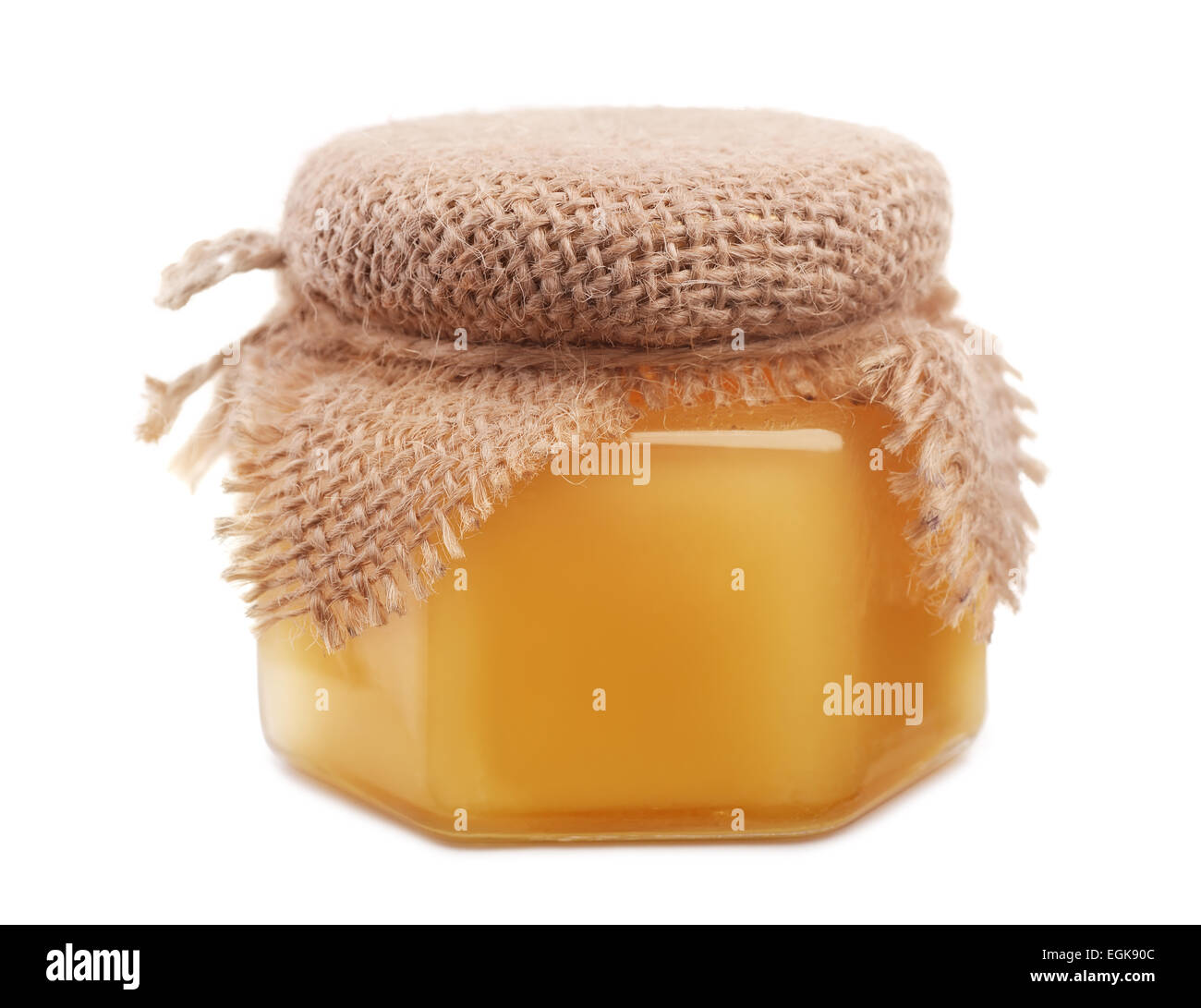 Honey pot isolated on white Stock Photo