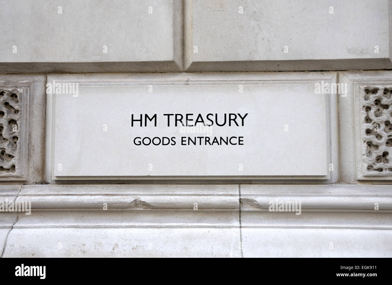 London, England, UK. HM Treasury Goods Entrance sign on the wall in King Charles Street, Westminster Stock Photo
