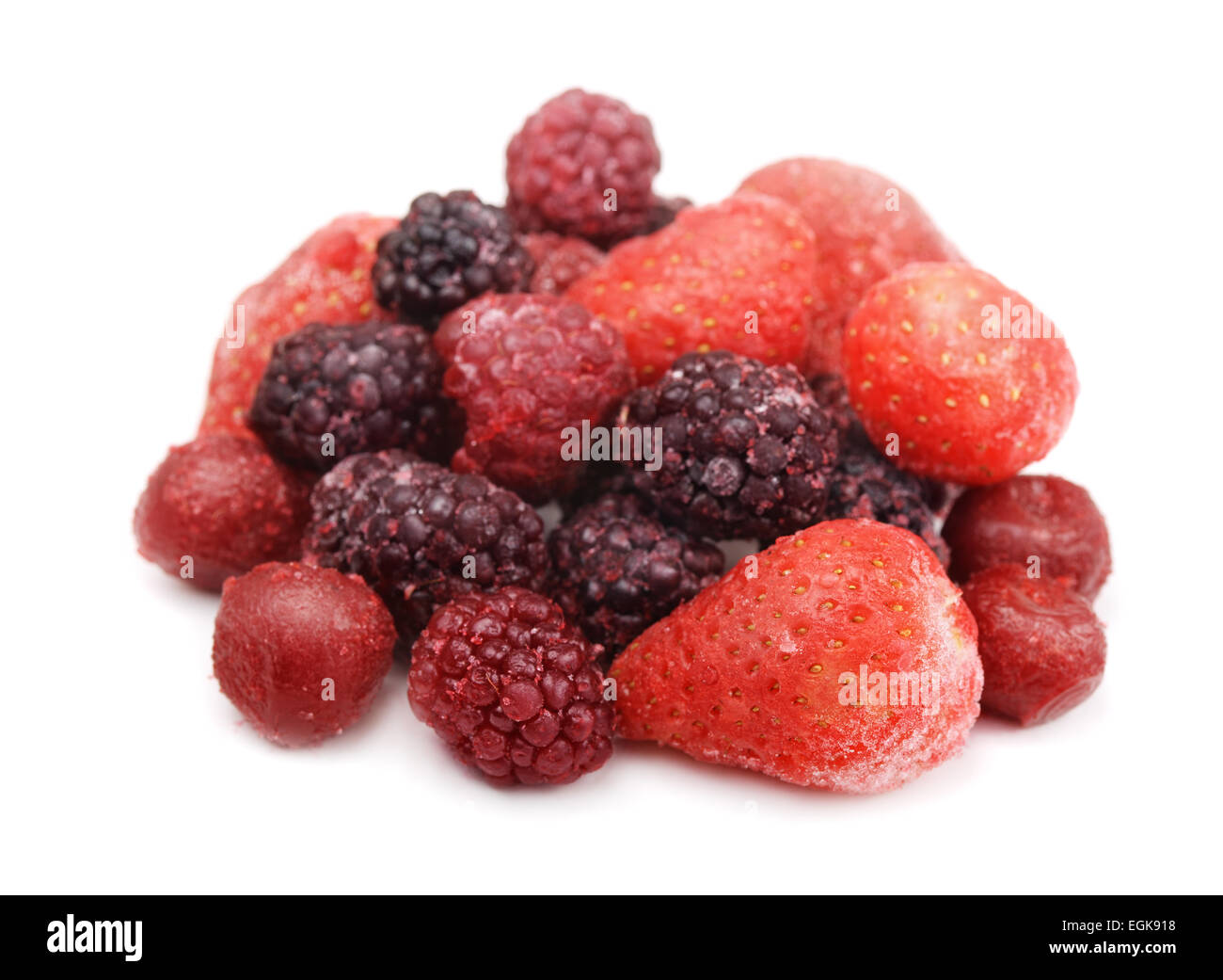 Pile of frozen mixed berries isolated on white Stock Photo