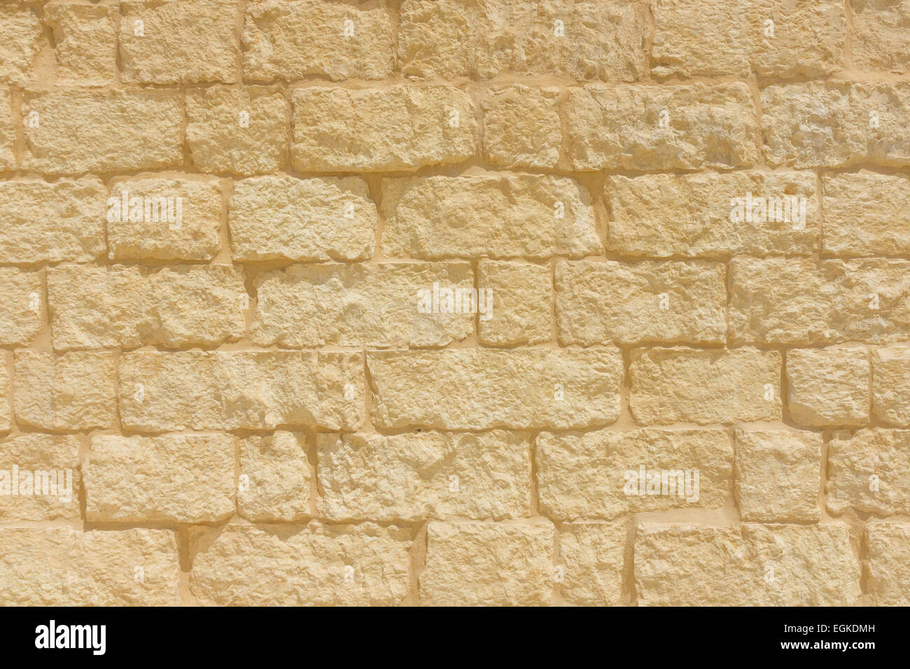 Sandstone brick wall background. Stock Photo