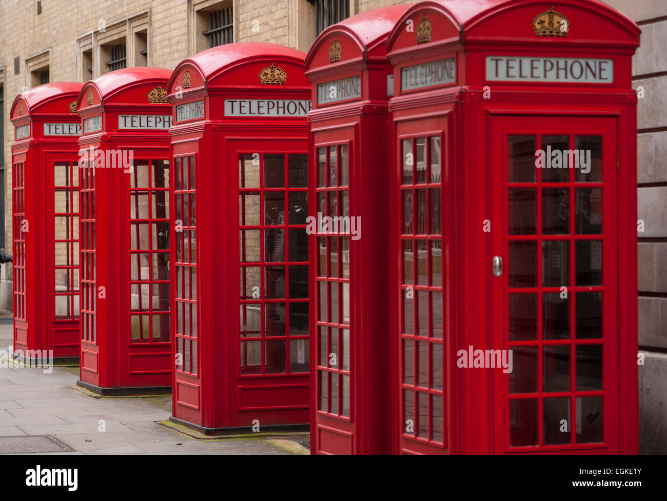 Row of red phoneboxes in Broad court, Drury lane Bow Street London Stock Photo